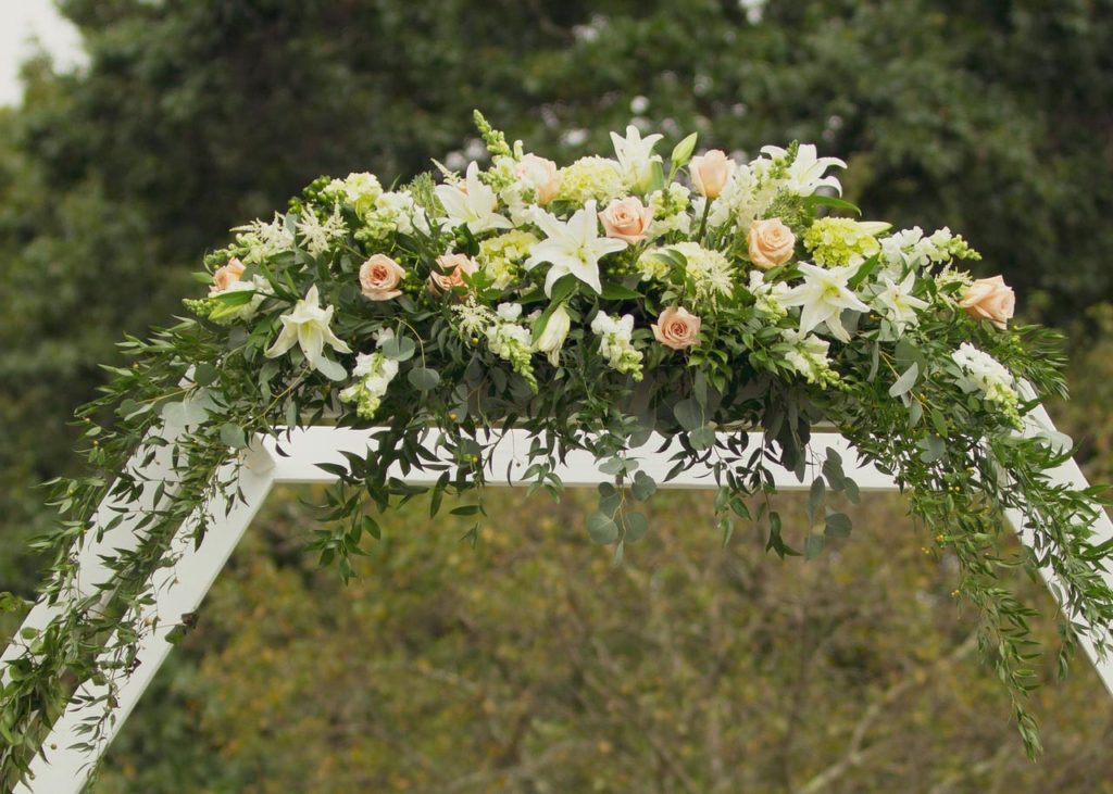 Wedding Ceremony - Arch with large floral arrangement detail