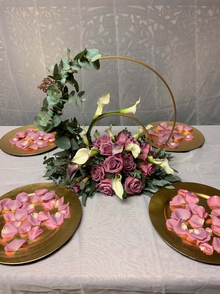 Wedding Reception Flower arrangement - Roses with Golden Circle and Plates